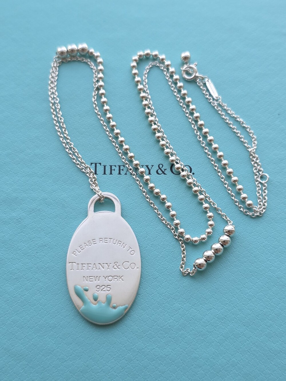 Retired Splash Oval tag on a 3p" mixed beaded chain